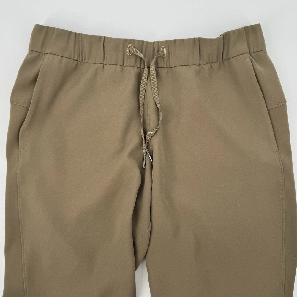 Lululemon‎ On The Fly Crop Pants Size 10 Khaki Woven Drawstring Stretch Casual